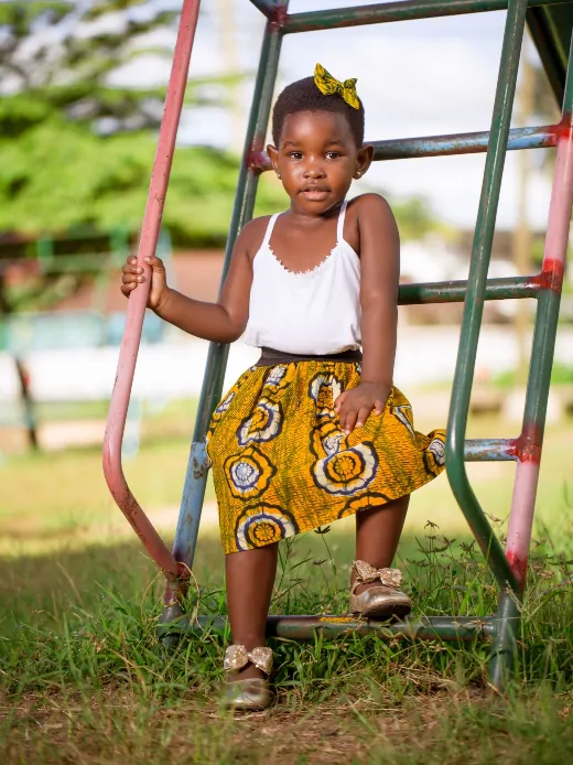 Yellow African print fabric girl's skirt model wearing