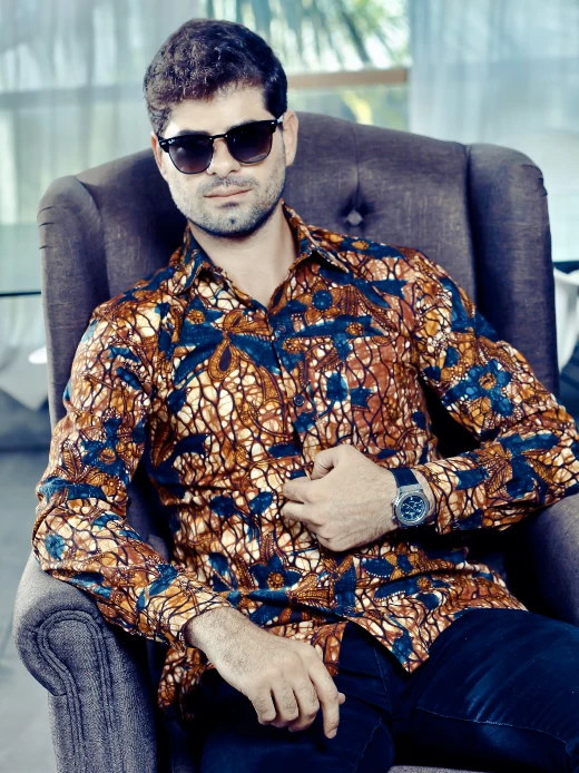Gold blue floral African print shirt for men model wearing front view