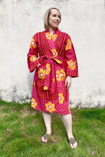 Women's pink orange flower Kanga African print fabric bathrobe model wearing