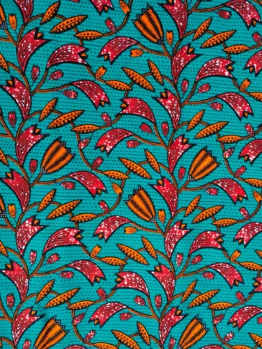Turquoise orange plant African Ankara fabric closeup